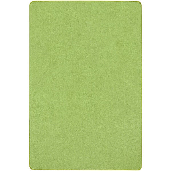 A lime green rectangular area rug with a yellow border on a white background.