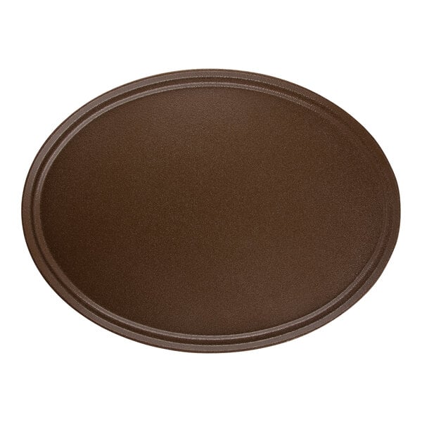 A brown oval Carlisle Griptite non skid serving tray.