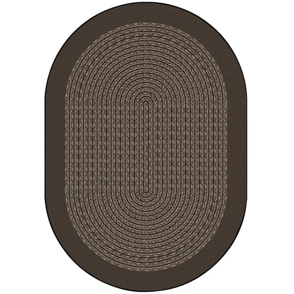 An oval brown area rug with a white center.