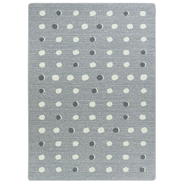 A grey and white rectangular area rug with white dots.