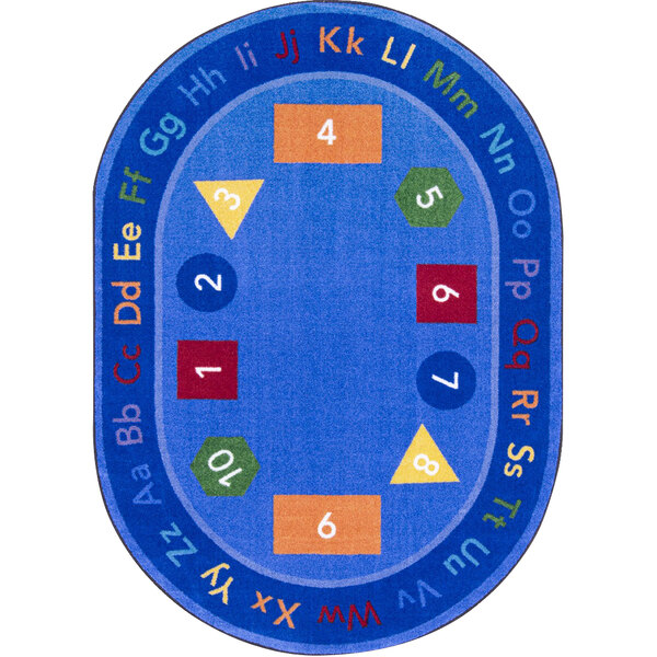 A multi-colored oval area rug with blue, numbers, and letters.