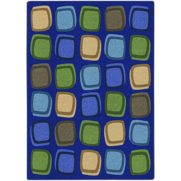 A white rectangular area rug with blue squares in different colors.