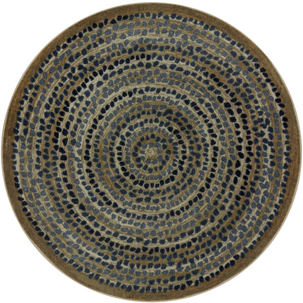 A Joy Carpets round area rug with a circular pattern.