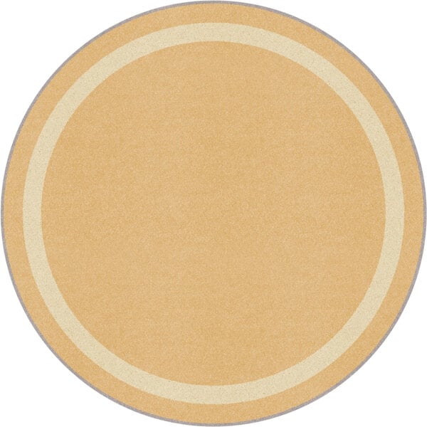 A round beige area rug with a white border.