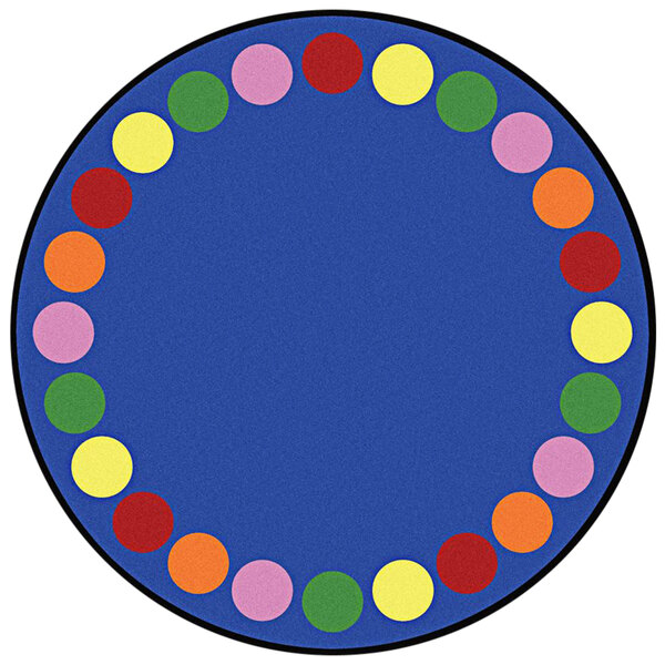 A multicolored round area rug with colorful circles on it.