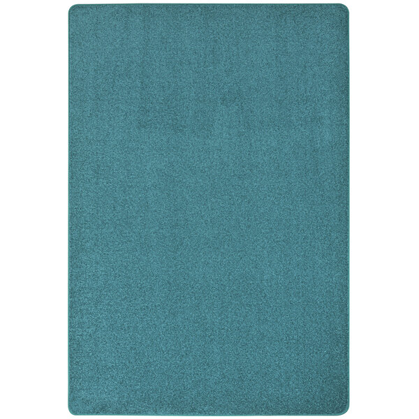 A mint green rectangle area rug with a white background.