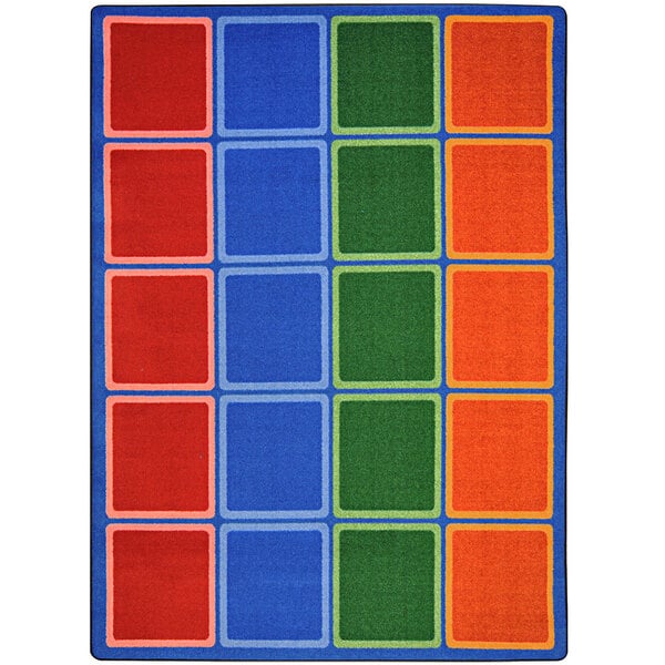A colorful area rug with red and blue squares.