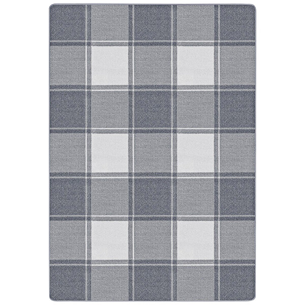 A Joy Carpets area rug with a cloudy plaid pattern and white border.