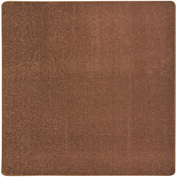 A brown square carpet with a white border.