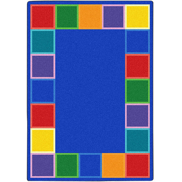 A colorful rectangular area rug with squares in blue, yellow, and pink.