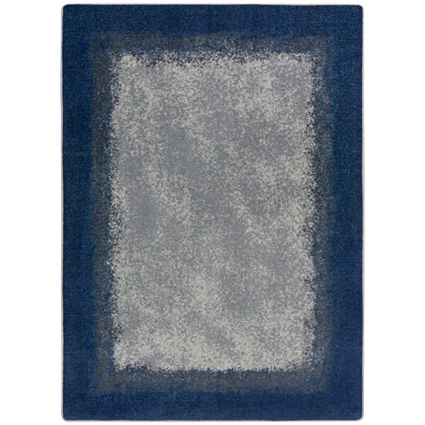 A rectangular marine blue area rug with a blue and gray square design.