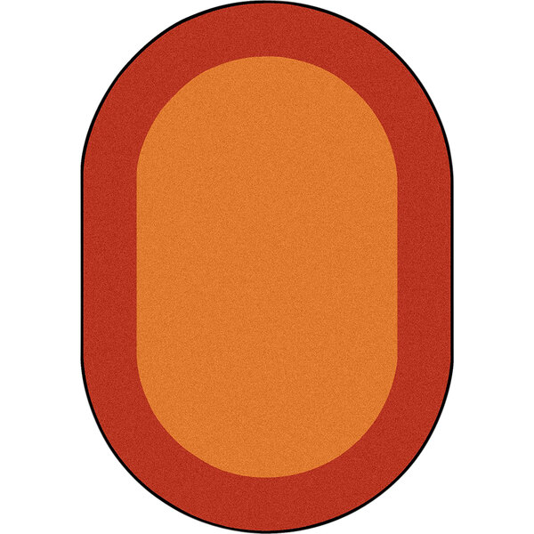 An oval orange rug with a red border and black accents.