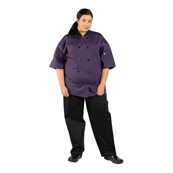 A unisex short sleeve chef coat in eggplant color with a mesh back, shown in a 4X size.