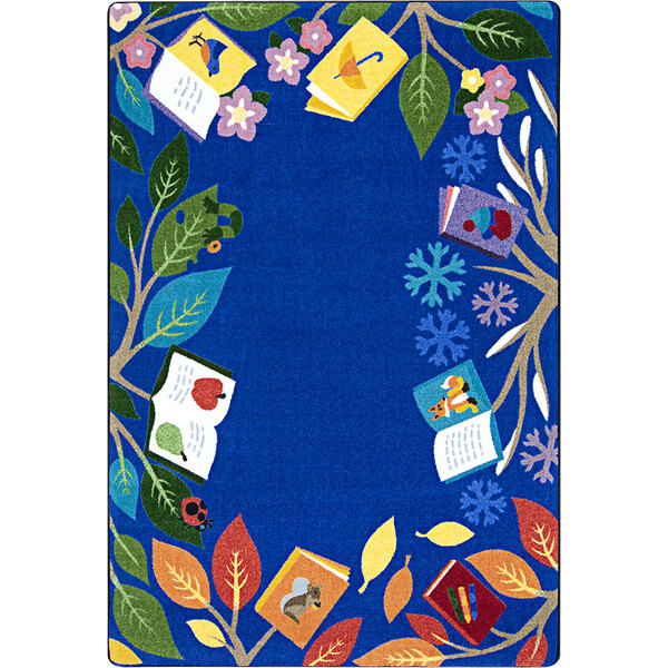 A multi-colored rectangle area rug with a pattern of trees and books.
