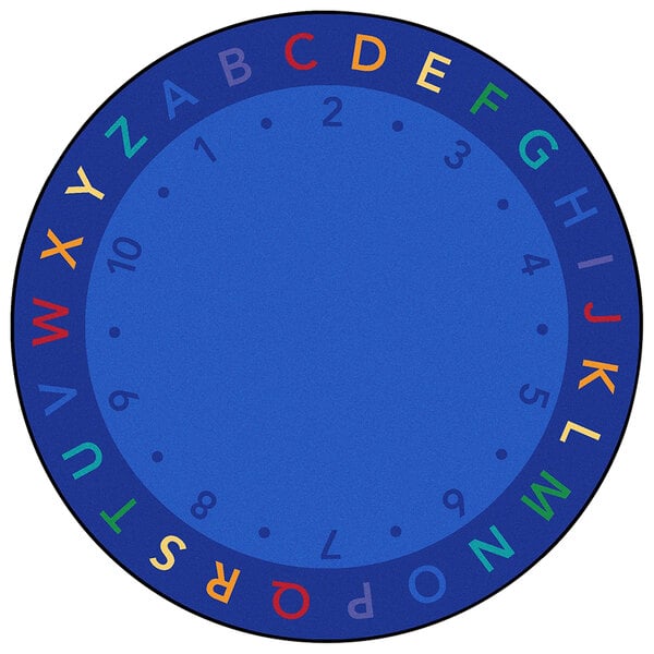 A white and multicolored round rug with letters and numbers in a blue circle.