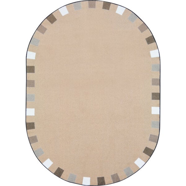 An oval beige rug with a black border.