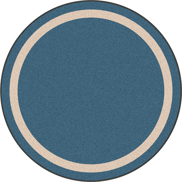 A white round area rug with a blue circle and white border.