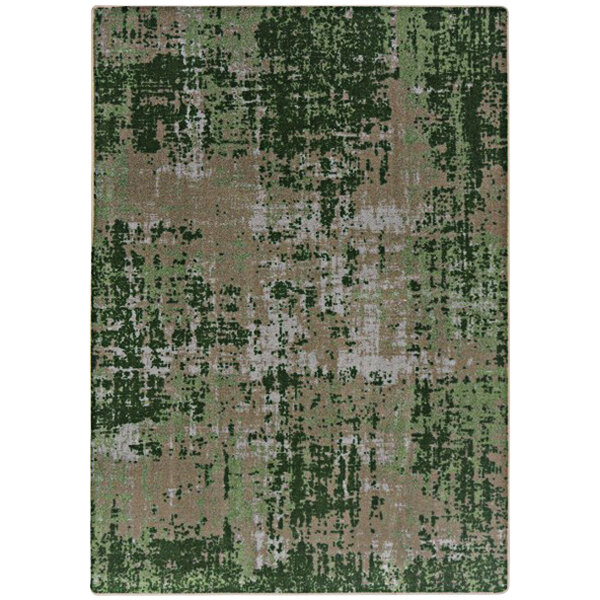 A close-up of a green and grey Joy Carpets area rug with a distressed look.