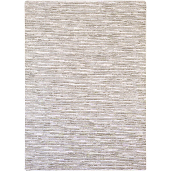 A white rectangle area rug with a light gray pattern.