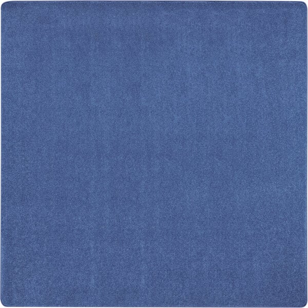 A blue square area rug with a white border.