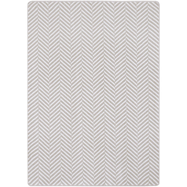 An ivory rectangular area rug with a chevron pattern in white and black.