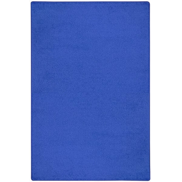 A royal blue rectangle area rug with a white border.