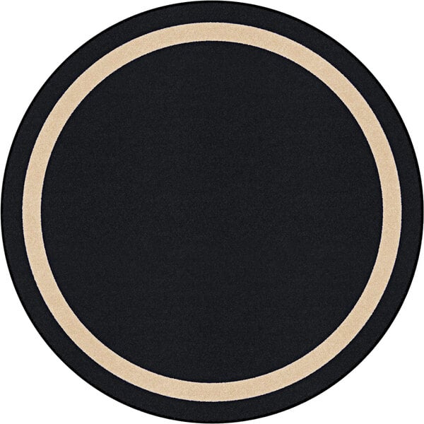 A round black and white rug with a beige circle border.