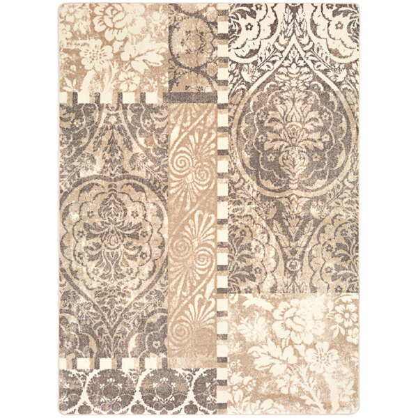 A French cream rectangular area rug with ornate beige and brown patterns.