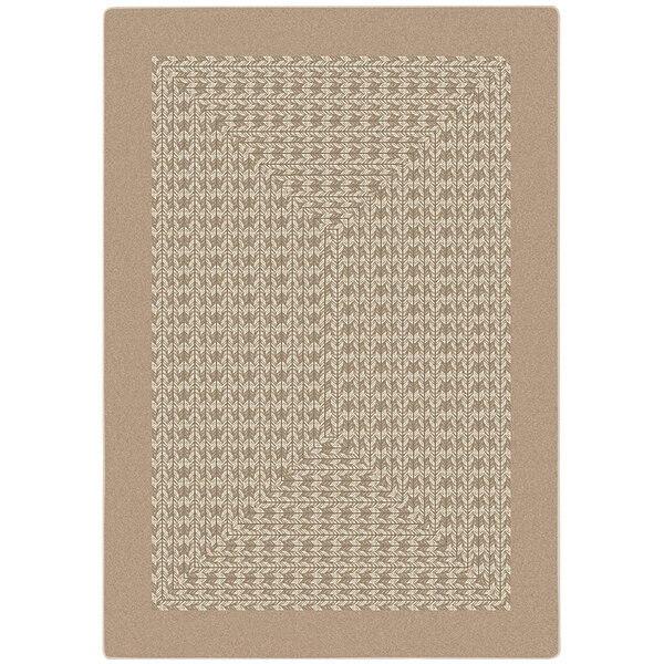 A close-up of a beige Joy Carpets area rug with a geometric pattern.