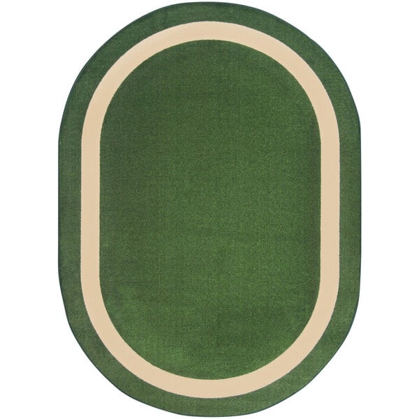 A green and white oval rug with a white border.