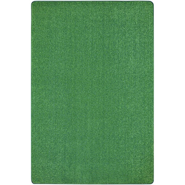 A grass green rectangle area rug with a white background.