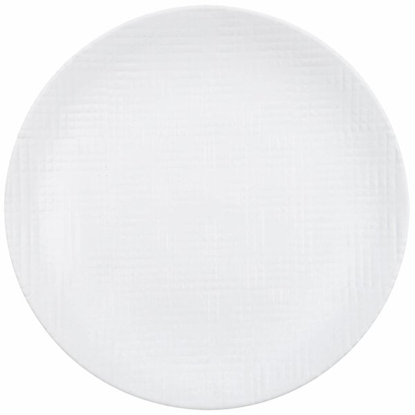 A Cal-Mil Sedona white melamine plate with a textured pattern.