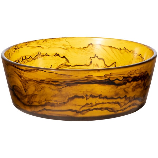 A yellow Bon Chef round resin bowl with black swirls.