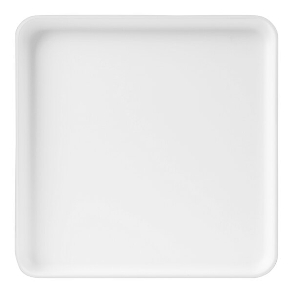 A white square plate with a raised rim.