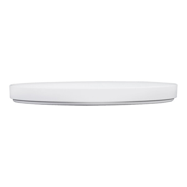A white circular Cal-Mil Hudson melamine plate on a white surface.