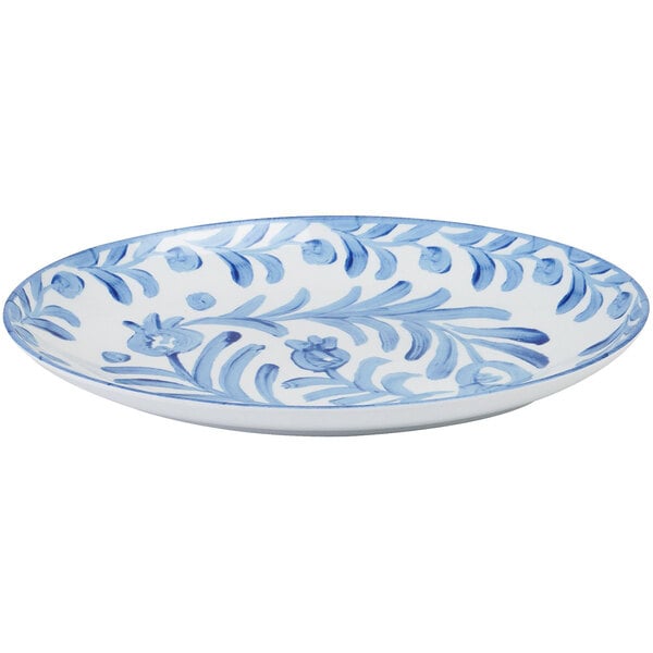 A blue and white Cal-Mil Costa oval melamine platter with a painted floral design.