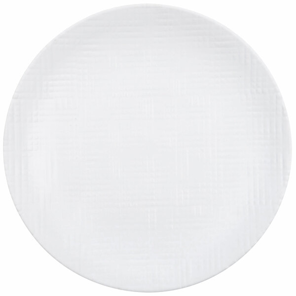 A Cal-Mil Sedona white melamine plate with a textured pattern.