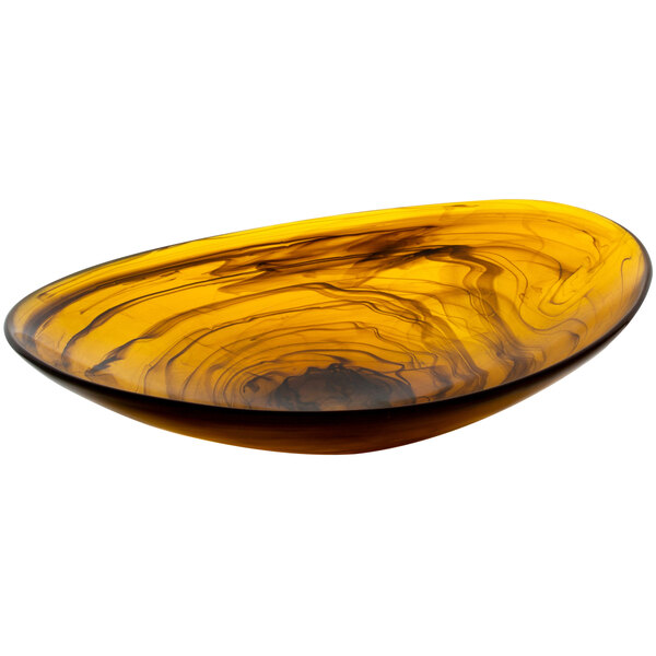 A yellow bowl with black swirls on the table in a salad bar.