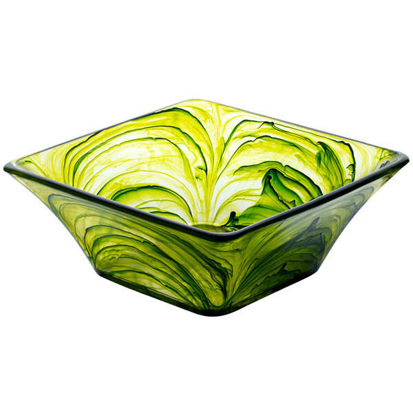 A green and white square Bon Chef Eden resin bowl with swirls on the counter.