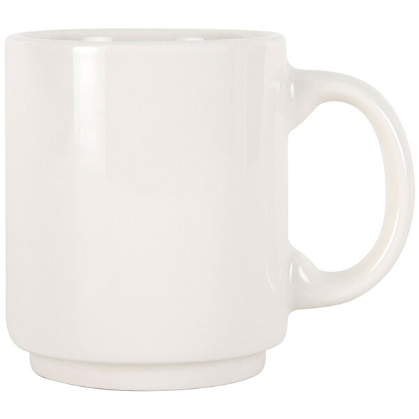 A Tuxton Rainier eggshell china mug with a handle on a white background.