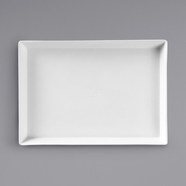 A Solia white rectangular sugarcane pulp plate.