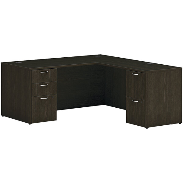 A Hon Java Oak laminate L-Station desk with storage pedestals.