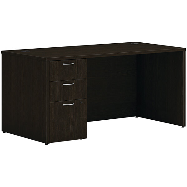 A Java Oak Hon laminate desk with storage pedestal.