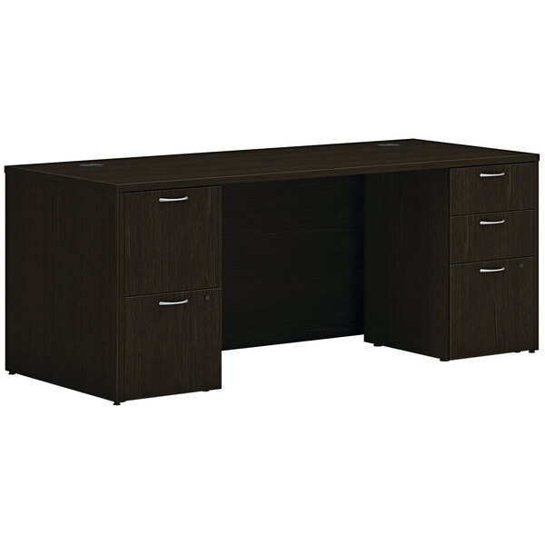 A Java oak laminate Hon desk with 2 storage pedestals.