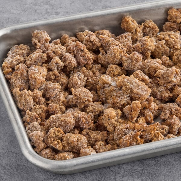 A tray of brown Hungry Planet Plant-Based Italian Sausage Crumble on a table.