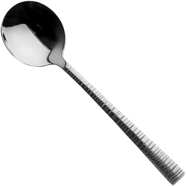 A Sola stainless steel soup spoon with a black handle.