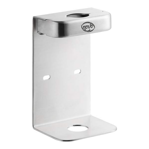 A silver metal wall mounted bracket with holes for a Novo by Noble Chemical bottle.