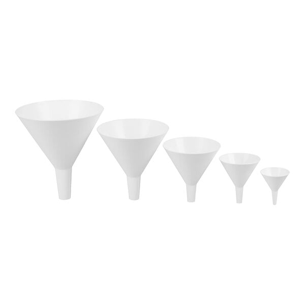 Five white plastic funnels of varying sizes are arranged in a row from largest to smallest.