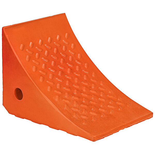 An orange plastic Vestil wheel chock with holes in it.