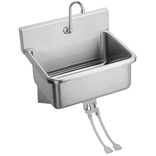 A Zurn Elkay stainless steel wall mounted utility sink with a foot-operated faucet.